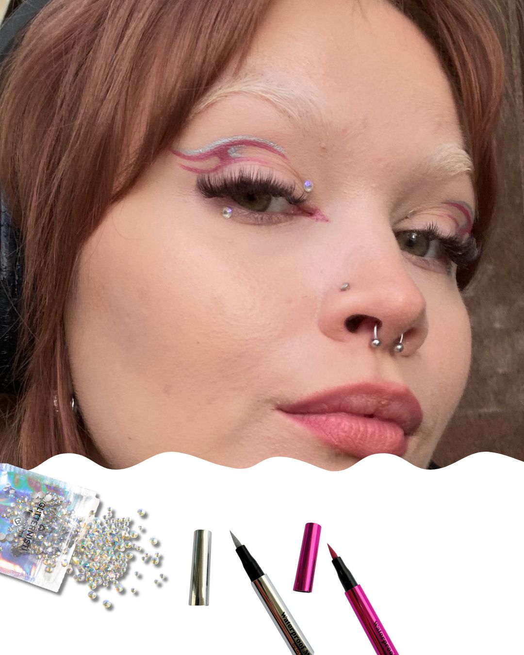 Naisen kasvot joilla graafinen pinkki eyeliner.