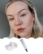 Naisen kasvot joilla glittermeikki.
